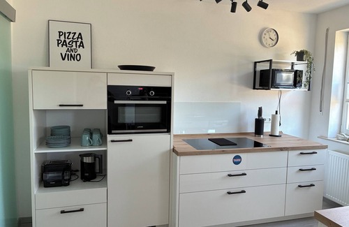 Warburg Appartement | Modern vacation apartment "Diemelaue" located on the Diemel, own garden seating area