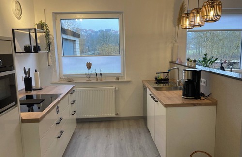 Warburg Appartement | Modern vacation apartment "Diemelaue" located on the Diemel, own garden seating area