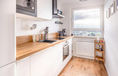 Steinbach Appartement | Moderne 2-Zimmer-Wohnung mit atemberaubender Skyline Aussicht auf Frankfurt!