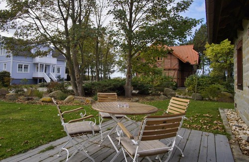 Wiek Appartement | moderne Ferienwohnung mit Kamin, Sauna, Terrasse - Ferienhaus Stenhuus FeWo 01