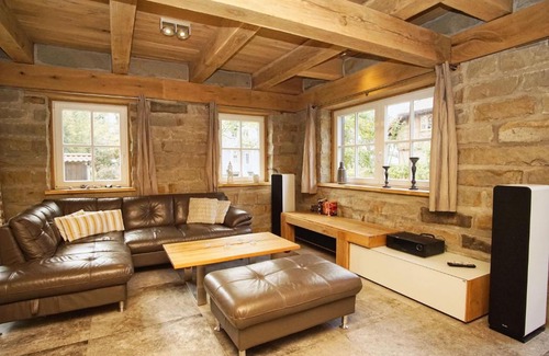 Wiek Appartement | moderne Ferienwohnung mit Kamin, Sauna, Terrasse - Ferienhaus Stenhuus FeWo 01