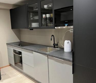 Tromso Appartement | Moderne liten leilighet på toppen av Tromsøyen