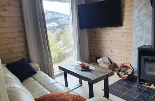 Luster Appartement | Molden 2-fjellutsikt og jacuzzi tilgang.