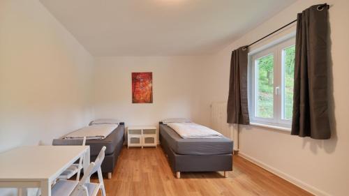 Ehrang-Quint Appartement | Monteurwohnungen in Trier - Parkplatz - Einzelbetten - Waschmaschine und Trockner