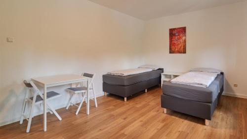 Ehrang-Quint Appartement | Monteurwohnungen in Trier - Parkplatz - Einzelbetten - Waschmaschine und Trockner