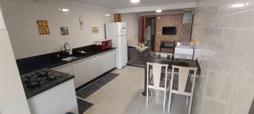 Carianos Appartement | Moradas Desterro, próximo ao aeroporto 01