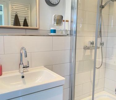 Carolinensiel Maison | Murmel 1 - Strandkorb, Wallbox, WLan, Kamin
