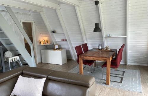 Carolinensiel Maison | Murmel 1 - Strandkorb, Wallbox, WLan, Kamin