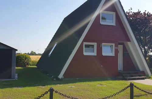 Carolinensiel Maison | Murmel 3 - Strandkorb, Wallbox, WLan, Kamin