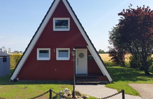 Carolinensiel Maison | Murmel 3 - Strandkorb, Wallbox, WLan, Kamin
