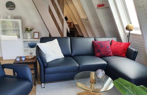 Carolinensiel Maison | Murmel 5 - Strandkorb, Wallbox, WLan, Kamin