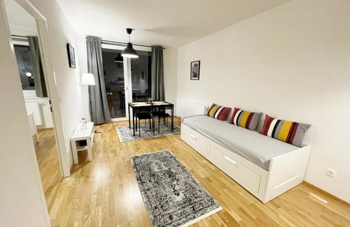Simmering Appartement | MUZETA11 - Modern Town Apartment with Balcony