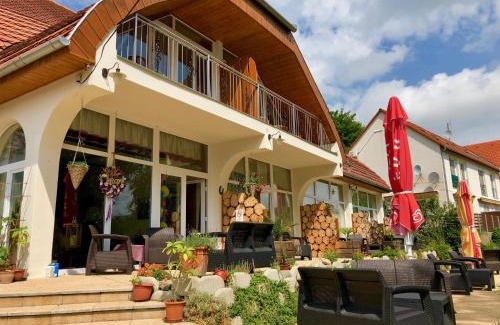 Orfu Maison | Napkelte Vendégház