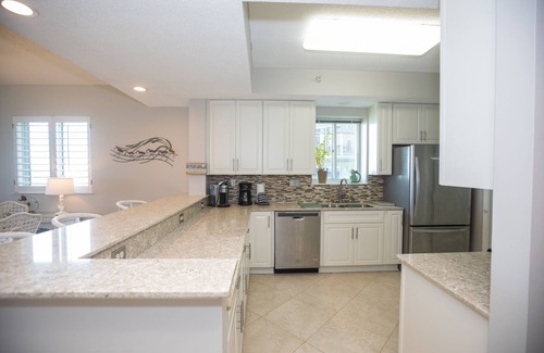 Navarre Beach Copropriété | Récemment rénové, propreté ultime, front de mer, plus grand balcon en bord de mer