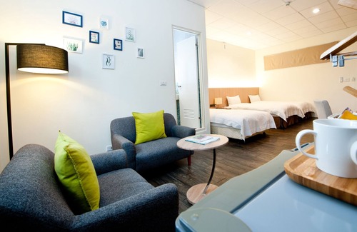 Puli Lit Et Petit-Déjeuner | NCNU Campus Inn