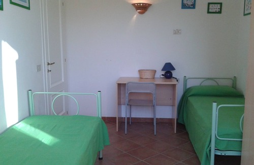Porto San Paolo Maison | Près de la mer - appartement de trois pièces avec grand jardin dans le BORGO de Porto San Paolo