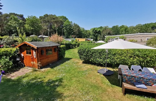 The Hague Chalet De Ski | Neat chalet on child-friendly campsite close to beach, town, dunes and forest.