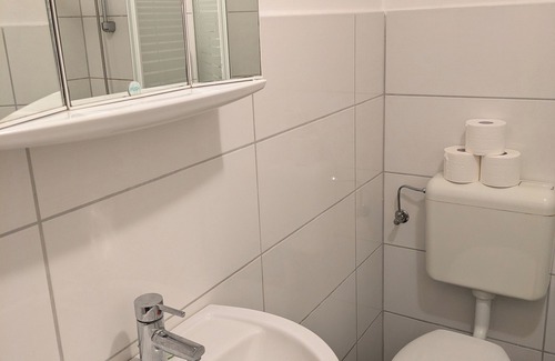 Heppens Maison | NestOaseWHV Küstenzimmer im Stadtherz