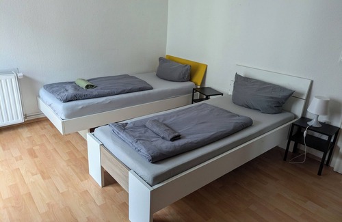 Heppens Maison | NestOaseWHV Küstenzimmer im Stadtherz