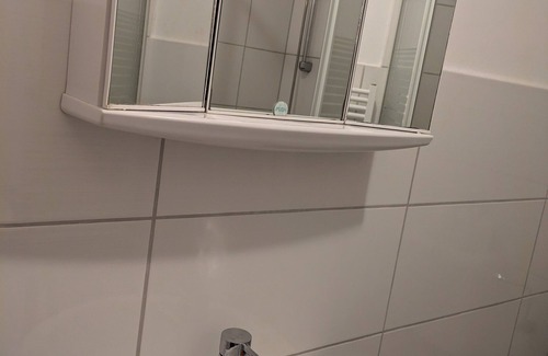 Heppens Maison | NestOaseWHV Küstenzimmer im Stadtherz