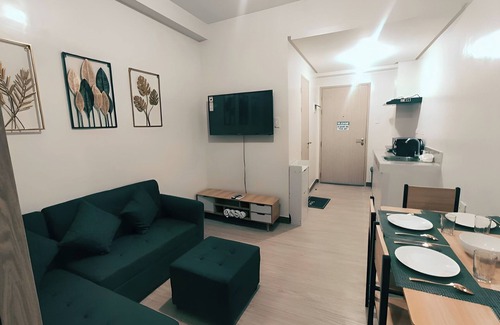 Novaliches Copropriété | Netflix+ Games+ Cooking+ Karaoke+ Wifi 1 BR Condo in Daily Relax Trees Residence