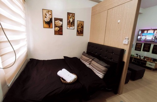 Novaliches Copropriété | Netflix+ Games+ Cooking+ Karaoke+ Wifi 1 BR Condo in Daily Relax Trees Residence