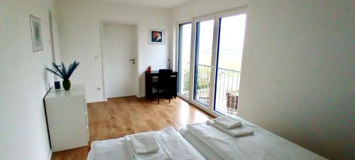 Fuerth Appartement | Neubau Appartement mit Terasse, privater Eingang,Parkplatz,Küche