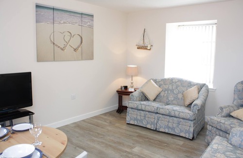 Banff Appartement | Nouveau appartement avec vue sur la mer, la plage et le port de Banff