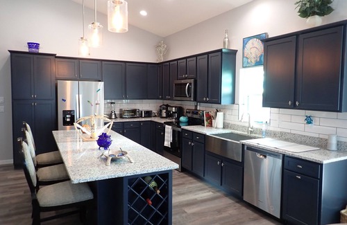 Spring Hill Maison | New Custom Waterfront Home - No Hurricane Damage