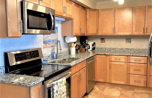 Malta Copropriété | New - First floor lakefront condo, dock access, walk to marina & restaurants!