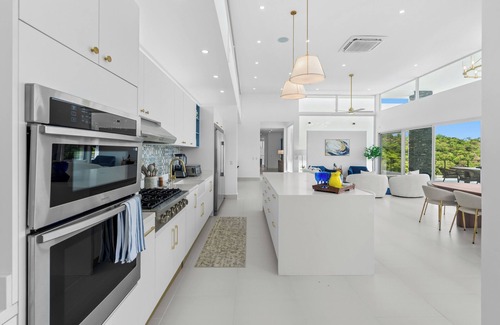 Coco Maison | New Gated Home - 6 Suites - Vacation Planning Included!