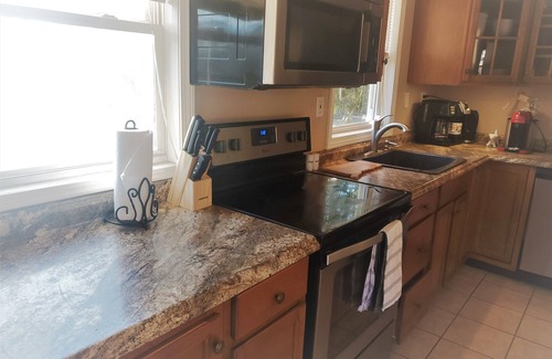 Jewett City Maison | NEW Listing: LAKEFRONT Home w/ Dock, Theater Room, Firepit. Near Mystic, Casinos