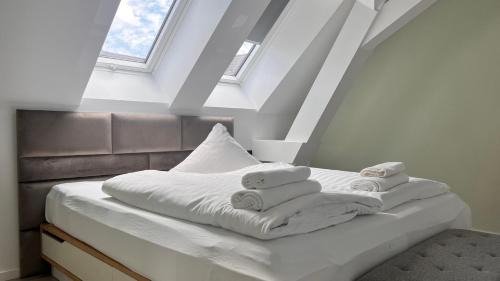 Wunsdorf Appartement | New Nomads Ferienwohnung am See