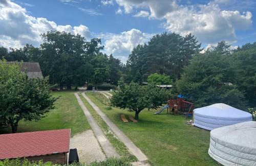 Wunsdorf Appartement | New Nomads Ferienwohnung am See