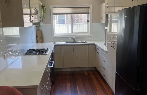 Warilla Maison | Newly added Coastal charm 80m walk to pristine warilla beach .