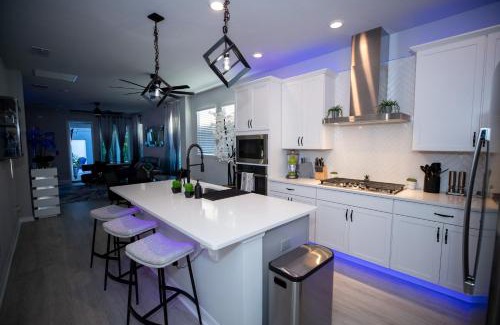 Colonialtown South Maison | Newly Constructed Modern Pet Friendly Zen Home with Private Home Theater & Hot Tub! home
