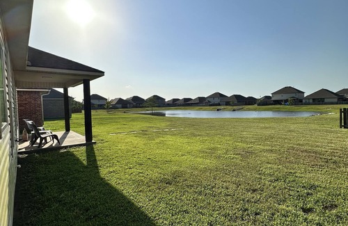 Carlyss Maison | Newly remodeled 2 story home with an amazing pond view!