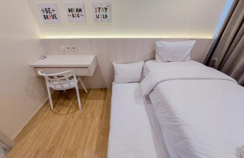 Bumi Serpong Damai Appartement | Nice and Spacious 2BR with Extra Room at Branz BSD City Apartment By Travelio