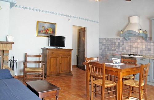 Rigutini Appartement | Joli appartement avec climatisation, WIFI, piscine, TV, patio, animaux admis et parking