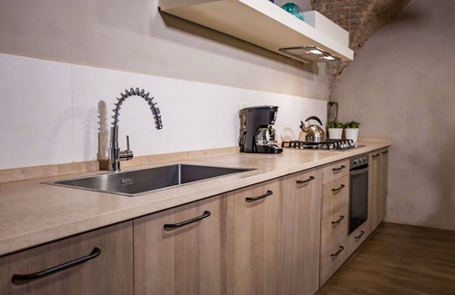Cortona Old Town Appartement | Agréable appartement pour 6 personnes avec climatisation, WIFI, TV et patio