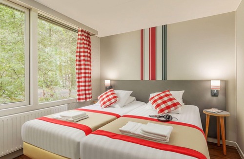 Les Barils Maison | Joli appartement dans une maison de vacances avec bain à remous, WIFI, piscine, TV et parking