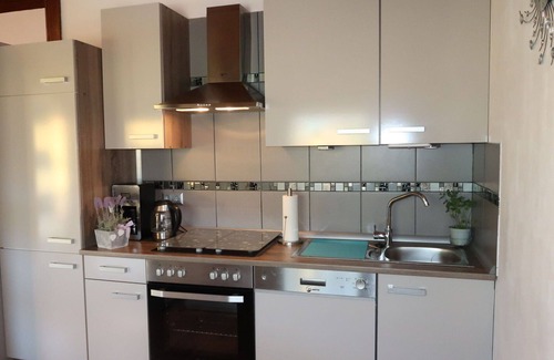 Machtlos Maison | Joli appartement dans une maison de vacances avec piscine, TV, terrasse et animaux admis