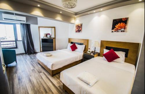 Al Duqqi Hôtel | Nile Guardian Hotel