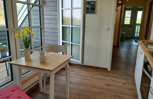 Bastorf Appartement | Nr.1/ 2-room-FeWo (right) 2-4 pers. +1 baby, loggia, upper floor - H3 Living at the farm café with party barn