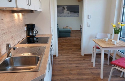Bastorf Appartement | Nr.1/ 2-room-FeWo (right) 2-4 pers. +1 baby, loggia, upper floor - H3 Living at the farm café with party barn