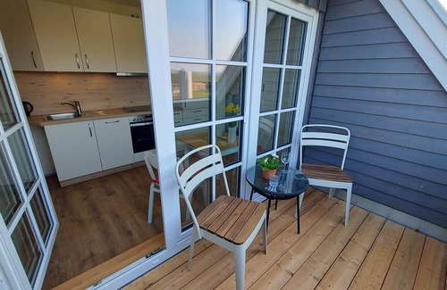 Bastorf Appartement | Nr.1/ 2-room-FeWo (right) 2-4 pers. +1 baby, loggia, upper floor - H3 Living at the farm café with party barn