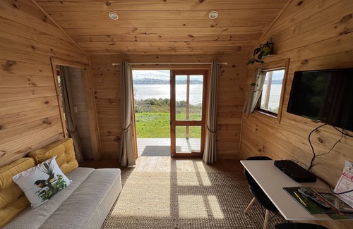 Mangonui Cabine | No other quite like it! Waterfront private cabin stay.