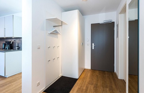 Bensersiel Appartement | Nordseenahes Ferienapartment mit Balkonen, Parkplatz, Schwimmbad- & Saunanutzung