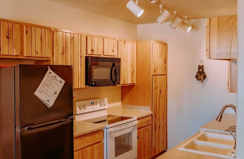 Puposky Villa | Northwoods Cabin Retreat - Steps to Resort Pool & Activities