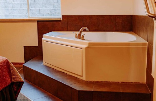 Puposky Villa | Northwoods Cabin Retreat - Steps to Resort Pool & Activities